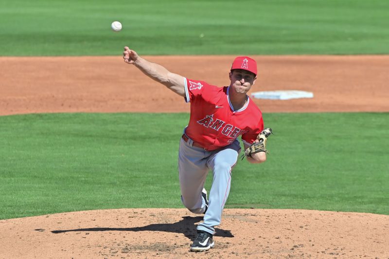 Mar 1, 2024; Peoria, Arizona, USA; Los Angeles Angels pitcher Travis MacGregor (74) throws in the second inning against the San Diego Padres during a spring training game at Peoria Sports Complex. Mandatory Credit: Matt Kartozian-USA TODAY Sports