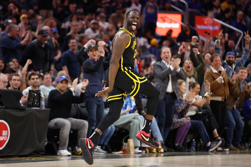 SAN FRANCISCO, CALIFORNIA - FEBRUARY 10: Draymond Green #23 of the Golden State Warriors reacts after making a basket in the fourth quarter against the Phoenix Suns at Chase Center on February 10, 2024 in San Francisco, California. NOTE TO USER: User expressly acknowledges and agrees that, by downloading and or using this photograph, User is consenting to the terms and conditions of the Getty Images License Agreement. (Photo by Lachlan Cunningham/Getty Images)