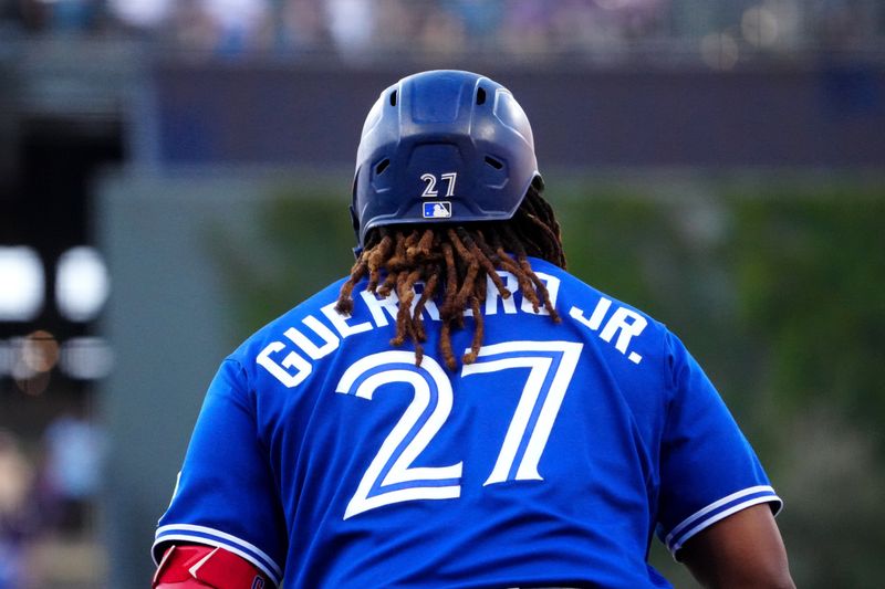 Sep 2, 2023; Denver, Colorado, USA; Detailed jersey view of Toronto Blue Jays first baseman Vladimir Guerrero Jr. (27) during the first inning against the Colorado Rockies at Coors Field. Mandatory Credit: Ron Chenoy-USA TODAY Sports