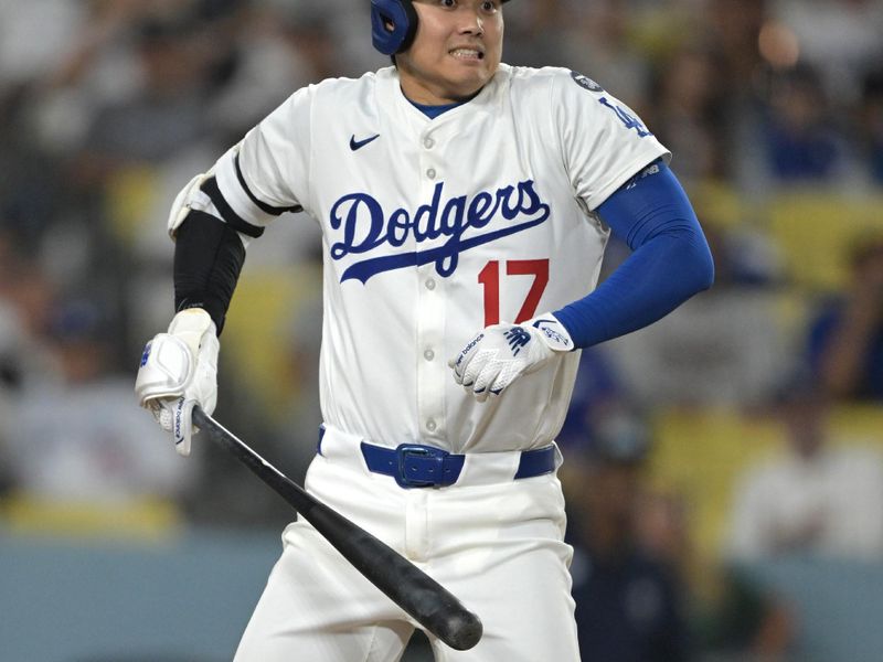 May 21, 2025; Los Angeles, California, USA;  Los Angeles Dodgers designated hitter Shohei Ohtani (17) reacts after hitting a foul ball down the right field line in the eighth inning against the Arizona Diamondbacks at Dodger Stadium. Mandatory Credit: Jayne Kamin-Oncea-Imagn Images