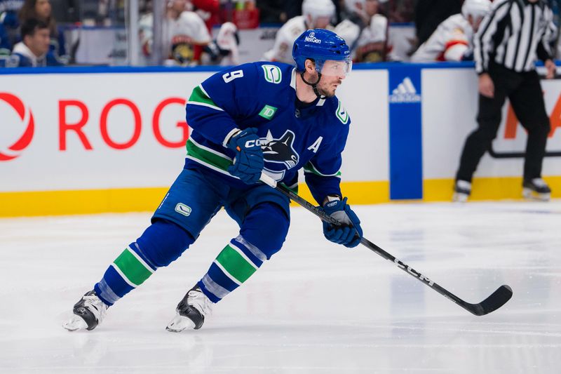 Dec 14, 2023; Vancouver, British Columbia, CAN; Vancouver Canucks forward J.T. Miller (9) skates against the Florida Panthers in the third period at Rogers Arena. Vancouver won 4-0. Mandatory Credit: Bob Frid-USA TODAY Sports