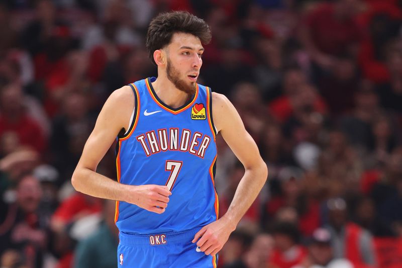 CHICAGO, ILLINOIS - OCTOBER 25: Chet Holmgren #7 of the Oklahoma City Thunder looks on against the Chicago Bulls during the first half at the United Center on October 25, 2023 in Chicago, Illinois. NOTE TO USER: User expressly acknowledges and agrees that, by downloading and or using this photograph, User is consenting to the terms and conditions of the Getty Images License Agreement. (Photo by Michael Reaves/Getty Images)