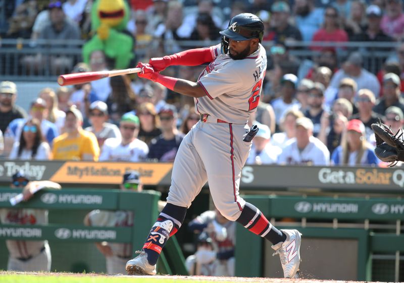 May 10, 2025; Pittsburgh, Pennsylvania, USA;  Atlanta Braves center fielder Michael Harris II (23) hits an RBI double against the Pittsburgh Pirates during the second inning at PNC Park. Mandatory Credit: Charles LeClaire-Imagn Images