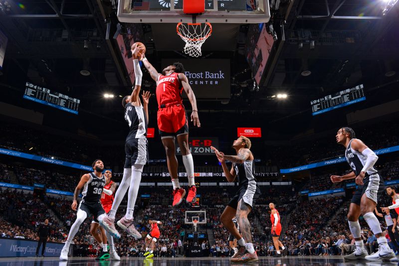 SAN ANTONIO, TX - MARCH 12: Victor Wembanyama #1 of the San Antonio Spurs rebounds the ball during the game against the Houston Rockets on March 12, 2024 at the Frost Bank Center in San Antonio, Texas. NOTE TO USER: User expressly acknowledges and agrees that, by downloading and or using this photograph, user is consenting to the terms and conditions of the Getty Images License Agreement. Mandatory Copyright Notice: Copyright 2024 NBAE (Photos by Jesse D. Garrabrant/NBAE via Getty Images)