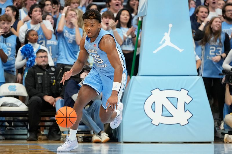 Nov 17, 2023; Chapel Hill, North Carolina, USA; North Carolina Tar Heels forward Harrison Ingram (55) brings the ball up the court in the first half at Dean E. Smith Center. Mandatory Credit: Bob Donnan-USA TODAY Sports