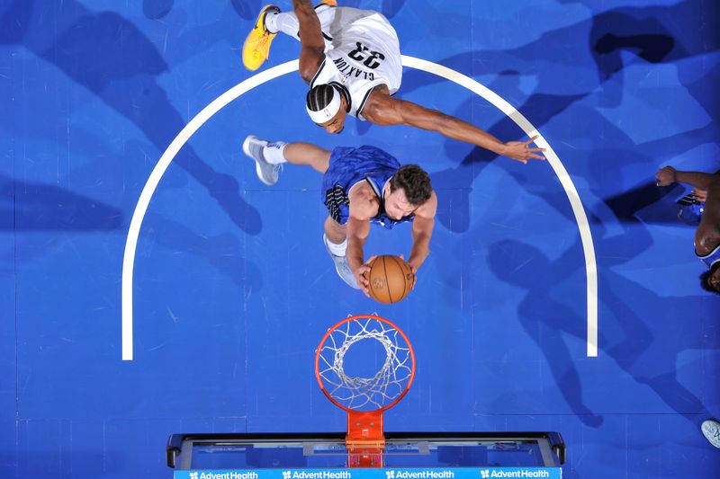 ORLANDO, FL - MARCH 13: Franz Wagner #22 of the Orlando Magic dunks the ball during the game against the Brooklyn Nets on March 13, 2024 at the Kia Center in Orlando, Florida. NOTE TO USER: User expressly acknowledges and agrees that, by downloading and or using this photograph, User is consenting to the terms and conditions of the Getty Images License Agreement. Mandatory Copyright Notice: Copyright 2024 NBAE (Photo by Fernando Medina/NBAE via Getty Images)