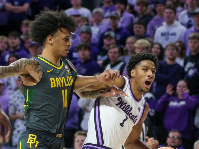 Jan 16, 2024; Manhattan, Kansas, USA; Kansas State Wildcats forward David N'Guessan (1) is guarded by Baylor Bears forward Jalen Bridges (11) during the first half at Bramlage Coliseum. Mandatory Credit: Scott Sewell-USA TODAY Sports