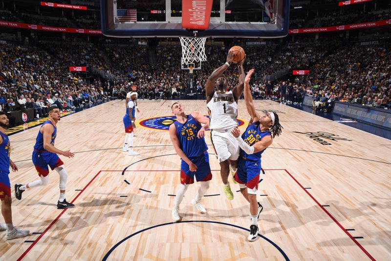 DENVER, CO - JANUARY 12: Zion Williamson #1 of the New Orleans Pelicans shoots the ball during the game against the Denver Nuggets on January 12, 2024 at the Ball Arena in Denver, Colorado. NOTE TO USER: User expressly acknowledges and agrees that, by downloading and/or using this Photograph, user is consenting to the terms and conditions of the Getty Images License Agreement. Mandatory Copyright Notice: Copyright 2024 NBAE (Photo by Garrett Ellwood/NBAE via Getty Images)