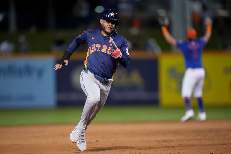 Mar 6, 2025; Port St. Lucie, Florida, USA;  Houston Astros infielder Jesus Bastidas (84) goes from first to third base on a hit in the sixth inning against the New York Mets at Clover Park. Mandatory Credit: Jim Rassol-Imagn Images