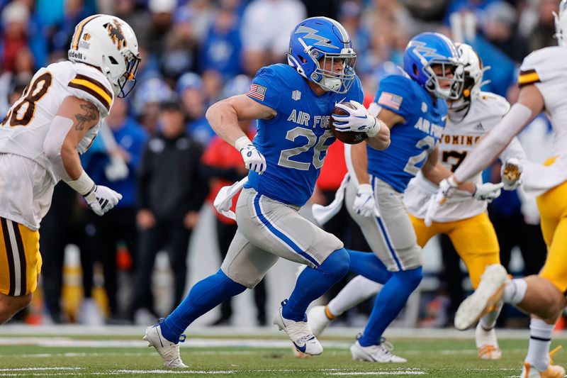 Oct 14, 2023; Colorado Springs, Colorado, USA; Air Force Falcons running back Owen Burk (26) runs the ball for a touchdown in the first quarter against the Wyoming Cowboys at Falcon Stadium. Mandatory Credit: Isaiah J. Downing-USA TODAY Sports