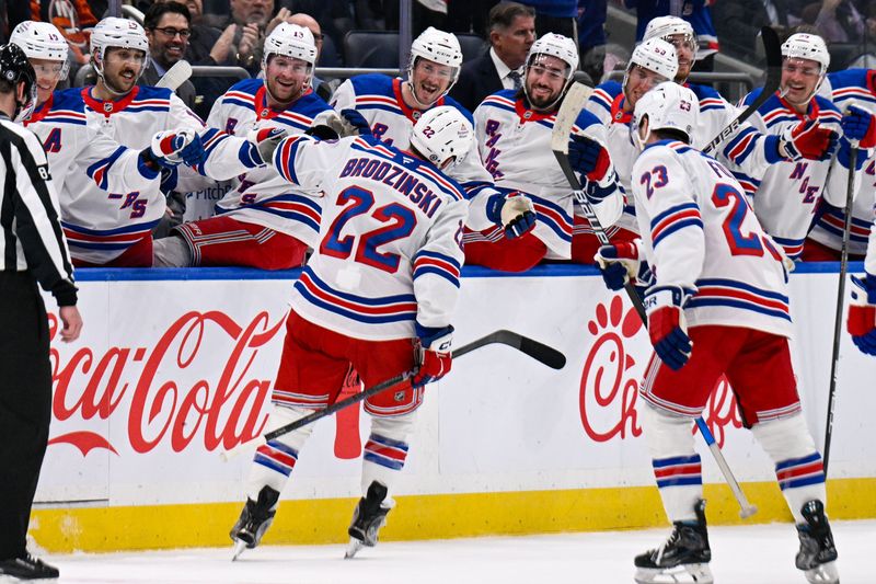 Feb 25, 2025; Elmont, New York, USA;  New York Rangers center Jonny Brodzinski (22) celebrates his second goal against the New York Islanders during the first period at UBS Arena. Mandatory Credit: Dennis Schneidler-Imagn Images