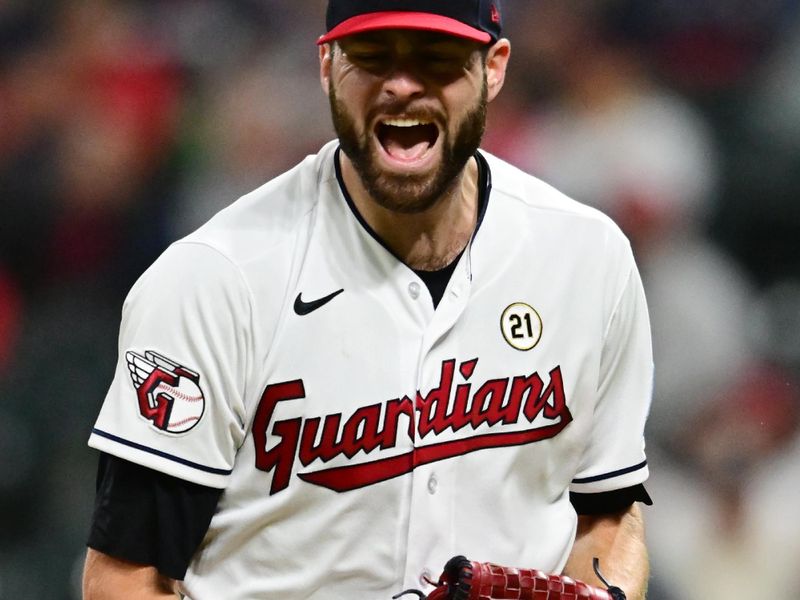 Sep 15, 2023; Cleveland, Ohio, USA; Cleveland Guardians starting pitcher Lucas Giolito (27) reacts after striking out Texas Rangers right fielder Robbie Grossman (not pictured) during the seventh inning at Progressive Field. Mandatory Credit: Ken Blaze-USA TODAY Sports