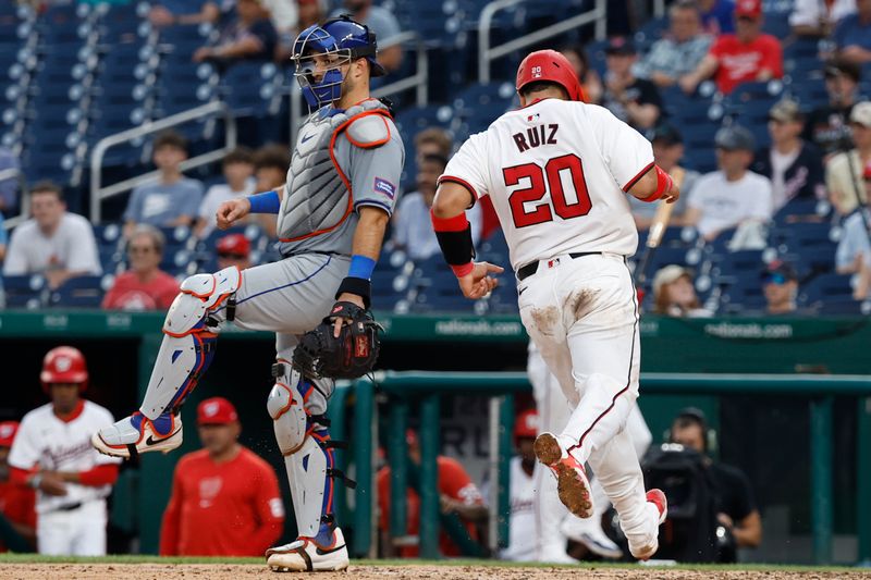 Jun 5, 2024; Washington, District of Columbia, USA; Washington Nationals catcher Keibert Ruiz (20) scores a run on a sacrifice fly by Nationals first baseman Joey Gallo (not pictured) against the New York Mets during the eighth inning at Nationals Park. Mandatory Credit: Geoff Burke-USA TODAY Sports