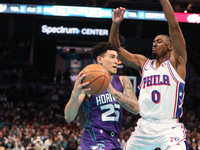 CHARLOTTE, NC - DECEMBER 3: KJ Simpson #25 of the Charlotte Hornets drives to the basket during the game against the Philadelphia 76ers during an NBA Emirates Cup game on December 3, 2024 at Spectrum Center in Charlotte, North Carolina. NOTE TO USER: User expressly acknowledges and agrees that, by downloading and or using this photograph, User is consenting to the terms and conditions of the Getty Images License Agreement. Mandatory Copyright Notice: Copyright 2024 NBAE (Photo by Brock Williams-Smith/NBAE via Getty Images)