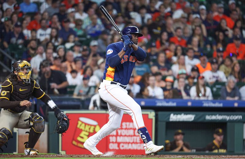 Sep 10, 2023; Houston, Texas, USA; Houston Astros left fielder Yordan Alvarez (44) hits a single during the first inning against the San Diego Padres at Minute Maid Park. Mandatory Credit: Troy Taormina-USA TODAY Sports