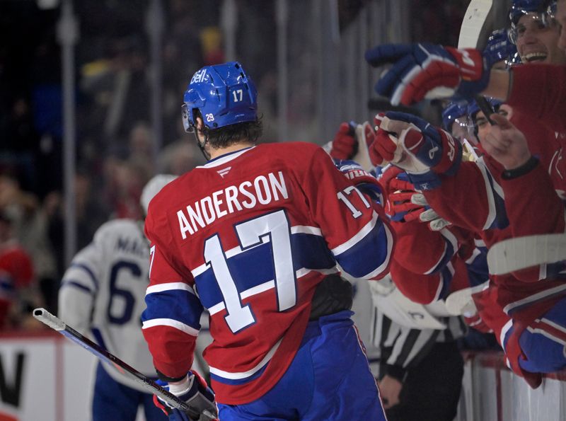 Nov 22, 2025; Montreal, Quebec, CAN; Montreal Canadiens forward Josh Anderson (17) celebrates with teammates after scoring a goal against the Toronto Maple Leafs during the second period at the Bell Centre. Mandatory Credit: Eric Bolte-Imagn Images