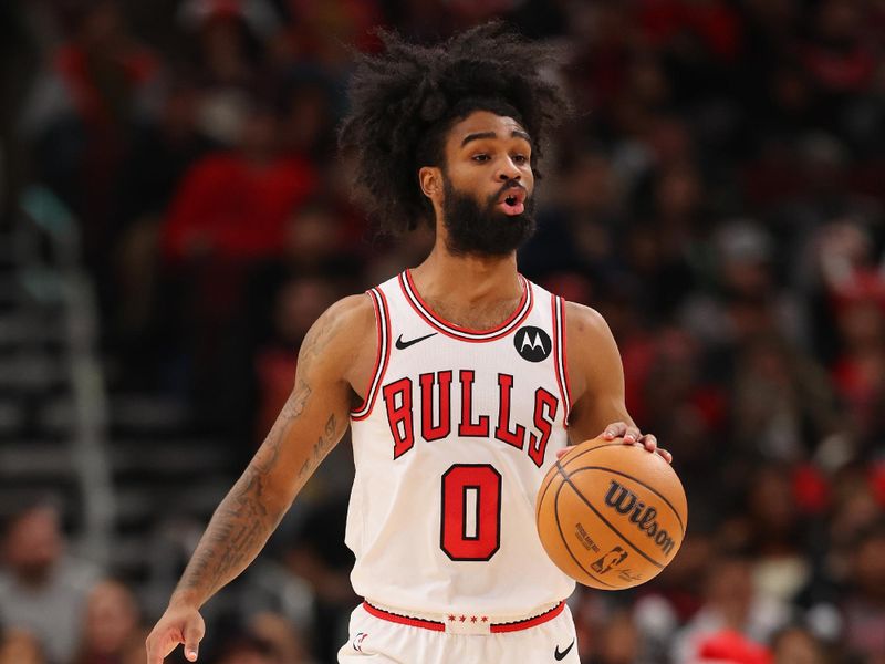 CHICAGO, ILLINOIS - DECEMBER 06: Coby White #0 of the Chicago Bulls dribbles up the court against the Charlotte Hornets during the first half at the United Center on December 06, 2023 in Chicago, Illinois. NOTE TO USER: User expressly acknowledges and agrees that, by downloading and or using this photograph, User is consenting to the terms and conditions of the Getty Images License Agreement.  (Photo by Michael Reaves/Getty Images)