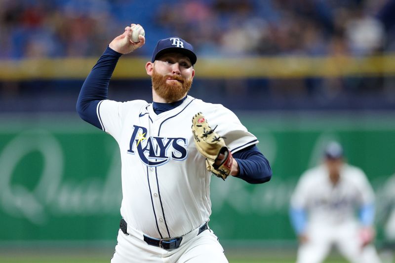 Sep 2, 2024; St. Petersburg, Florida, USA; Tampa Bay Rays pitcher Zack Littell (52) throws a pitch against the Los Minnesota Twins in the first inning at Tropicana Field. Mandatory Credit: Nathan Ray Seebeck-USA TODAY Sports