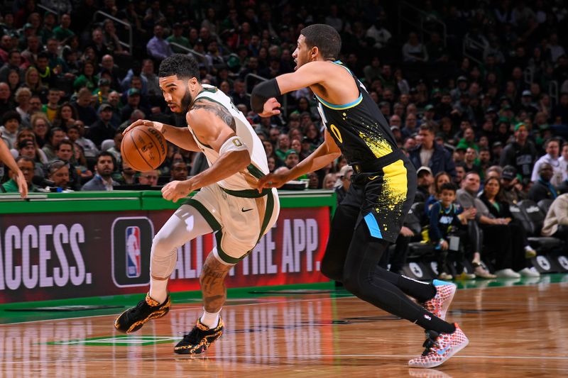 BOSTON, MA - JANUARY 30: Jayson Tatum #0 of the Boston Celtics dribbles the ball during the game against the Indiana Pacers on January 30, 2024 at the TD Garden in Boston, Massachusetts. NOTE TO USER: User expressly acknowledges and agrees that, by downloading and or using this photograph, User is consenting to the terms and conditions of the Getty Images License Agreement. Mandatory Copyright Notice: Copyright 2024 NBAE  (Photo by Brian Babineau/NBAE via Getty Images)