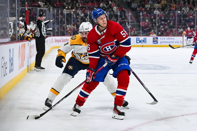 Dec 10, 2023; Montreal, Quebec, CAN; Montreal Canadiens right wing Jesse Ylonen (56) plays the puck against Nashville Predators left wing Filip Forsberg (9) during the third period at Bell Centre. Mandatory Credit: David Kirouac-USA TODAY Sports
