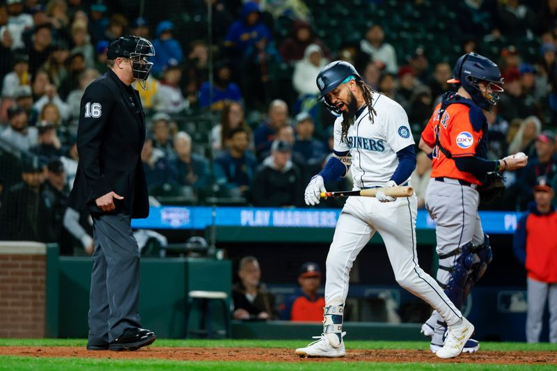Apr 8, 2025; Seattle, Washington, USA; Seattle Mariners shortstop J.P. Crawford (3) reacts after striking out against the Houston Astros during the tenth inning at T-Mobile Park. Mandatory Credit: Joe Nicholson-Imagn Images
