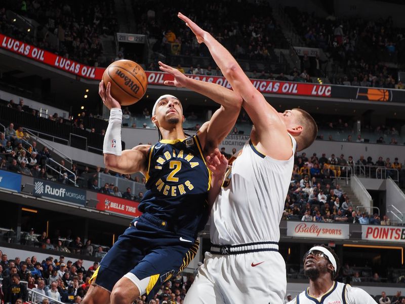 INDIANAPOLIS, IN - JANUARY 23: Andrew Nembhard #2 of the Indiana Pacers drives to the basket during the game against the Denver Nuggets on January 23, 2024 at Gainbridge Fieldhouse in Indianapolis, Indiana. NOTE TO USER: User expressly acknowledges and agrees that, by downloading and or using this Photograph, user is consenting to the terms and conditions of the Getty Images License Agreement. Mandatory Copyright Notice: Copyright 2024 NBAE (Photo by Ron Hoskins/NBAE via Getty Images)