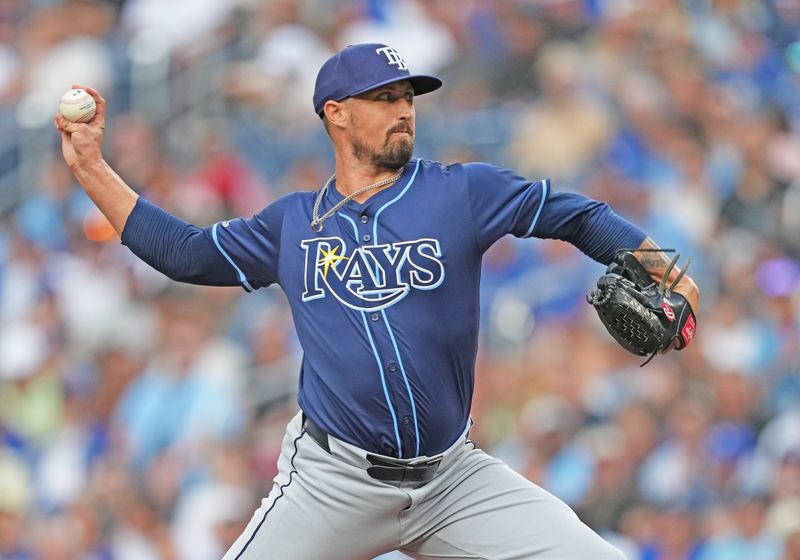 Jul 23, 2024; Toronto, Ontario, CAN; Tampa Bay Rays starting pitcher Shawn Armstrong (64) throws a pitch Toronto Blue Jays during the first inning at Rogers Centre. Mandatory Credit: Nick Turchiaro-USA TODAY Sports