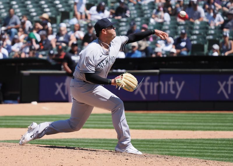 Jun 29, 2023; Oakland, California, USA; New York Yankees relief pitcher Nick Ramirez (63) pitches the ball against the Oakland Athletics during the eighth inning at Oakland-Alameda County Coliseum. Mandatory Credit: Kelley L Cox-USA TODAY Sports