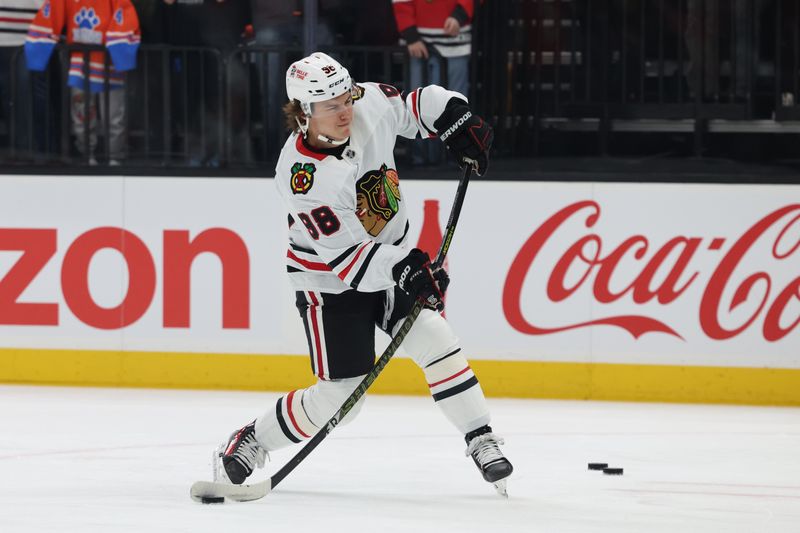Feb 25, 2025; Salt Lake City, Utah, USA; Chicago Blackhawks center Connor Bedard (98) warms up before a game against the Utah Hockey Club at Delta Center. Mandatory Credit: Rob Gray-Imagn Images