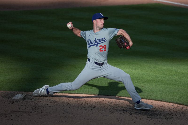 May 28, 2024; New York, NY, USA; Los Angeles Dodgers relief pitcher Michael Grove (29) delivers a pitch during the eighth inning against the New York Mets at Citi Field. Mandatory Credit: Vincent Carchietta-USA TODAY Sports