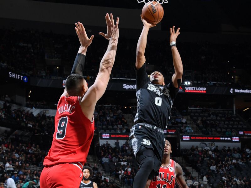 SAN ANTONIO, TX - DECEMBER 5: Keldon Johnson #0 of the San Antonio Spurs drives to the basket during the game against the Chicago Bulls on December 5, 2024 at the Frost Bank Center in San Antonio, Texas. NOTE TO USER: User expressly acknowledges and agrees that, by downloading and or using this photograph, user is consenting to the terms and conditions of the Getty Images License Agreement. Mandatory Copyright Notice: Copyright 2024 NBAE (Photos by Michael Gonzales/NBAE via Getty Images)