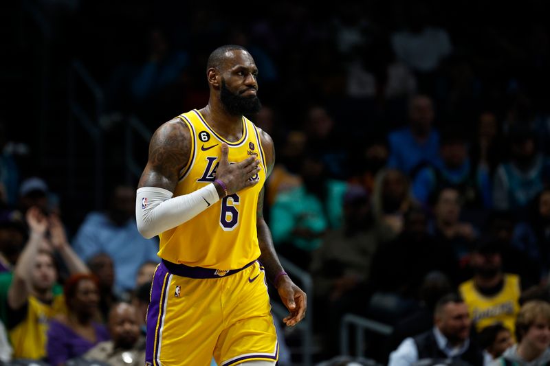 CHARLOTTE, NORTH CAROLINA - JANUARY 02: LeBron James #6 of the Los Angeles Lakers reacts during the second quarter of the game against the Charlotte Hornets at Spectrum Center on January 02, 2023 in Charlotte, North Carolina. NOTE TO USER: User expressly acknowledges and agrees that, by downloading and or using this photograph, User is consenting to the terms and conditions of the Getty Images License Agreement. (Photo by Jared C. Tilton/Getty Images)