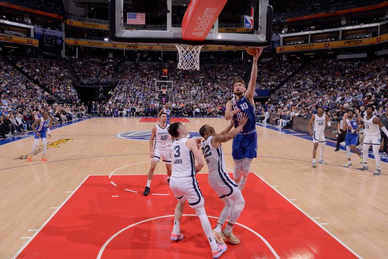 SACRAMENTO, CA - MARCH 18: Domantas Sabonis #10 of the Sacramento Kings drives to the basket during the game against the Memphis Grizzlies on March 18, 2024 at Golden 1 Center in Sacramento, California. NOTE TO USER: User expressly acknowledges and agrees that, by downloading and or using this Photograph, user is consenting to the terms and conditions of the Getty Images License Agreement. Mandatory Copyright Notice: Copyright 2024 NBAE (Photo by Rocky Widner/NBAE via Getty Images)