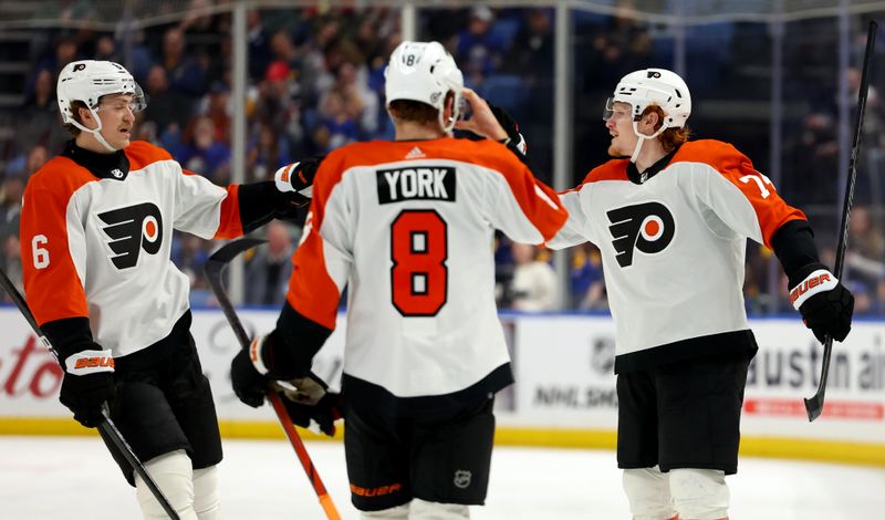 Apr 5, 2024; Buffalo, New York, USA;  Philadelphia Flyers right wing Owen Tippett (74) celebrates his goal with teammates during the third period against the Buffalo Sabres at KeyBank Center. Mandatory Credit: Timothy T. Ludwig-USA TODAY Sports