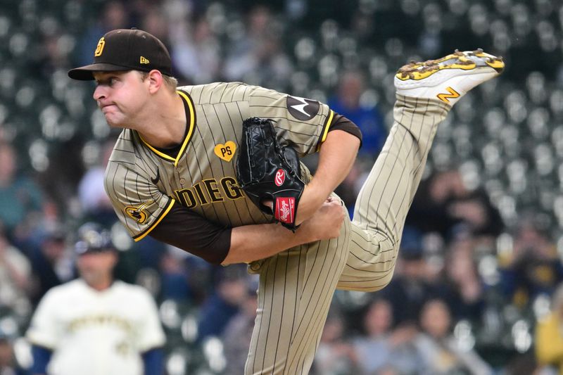 Apr 17, 2024; Milwaukee, Wisconsin, USA; San Diego Padres pitcher Michael King (34) throws a pitch in the fourth inning against the Milwaukee Brewers at American Family Field. Mandatory Credit: Benny Sieu-USA TODAY Sports