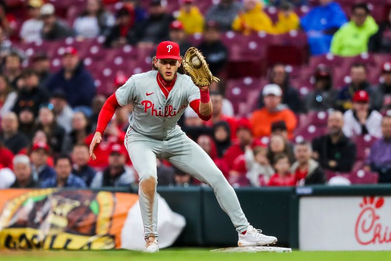 Apr 23, 2024; Cincinnati, Ohio, USA; Philadelphia Phillies first baseman Alec Bohm (28) tags first to get Cincinnati Reds designated hitter Nick Martini (not pictured) out in the second inning at Great American Ball Park. Mandatory Credit: Katie Stratman-USA TODAY Sports