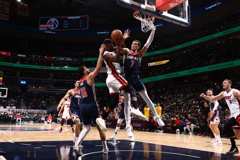 WASHINGTON, DC -? MARCH 31: Jimmy Butler #22 of the Miami Heat handles the ball during the game against the Washington Wizards on March 31, 2024 at Capital One Arena in Washington, DC. NOTE TO USER: User expressly acknowledges and agrees that, by downloading and or using this Photograph, user is consenting to the terms and conditions of the Getty Images License Agreement. Mandatory Copyright Notice: Copyright 2024 NBAE (Photo by Kenny Giarla/NBAE via Getty Images)