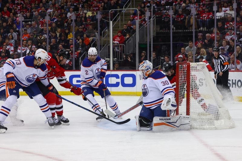 Dec 21, 2023; Newark, New Jersey, USA; New Jersey Devils right wing Timo Meier (28) scores a goal against the Edmonton Oilers during the second period at Prudential Center. Mandatory Credit: Ed Mulholland-USA TODAY Sports