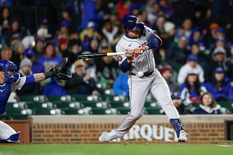 Apr 24, 2024; Chicago, Illinois, USA; Houston Astros outfielder Jake Meyers (6) is hit by a pitch from Chicago Cubs relief pitcher Adbert Alzolay during the fifth inning at Wrigley Field. Mandatory Credit: Kamil Krzaczynski-USA TODAY Sports