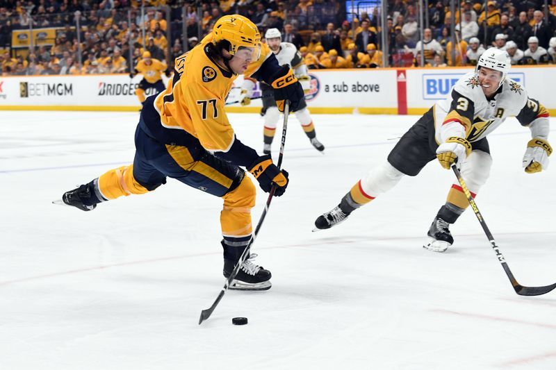 Mar 26, 2024; Nashville, Tennessee, USA; Nashville Predators right wing Luke Evangelista (77) shoots the puck during the first period against the Vegas Golden Knights at Bridgestone Arena. Mandatory Credit: Christopher Hanewinckel-USA TODAY Sports