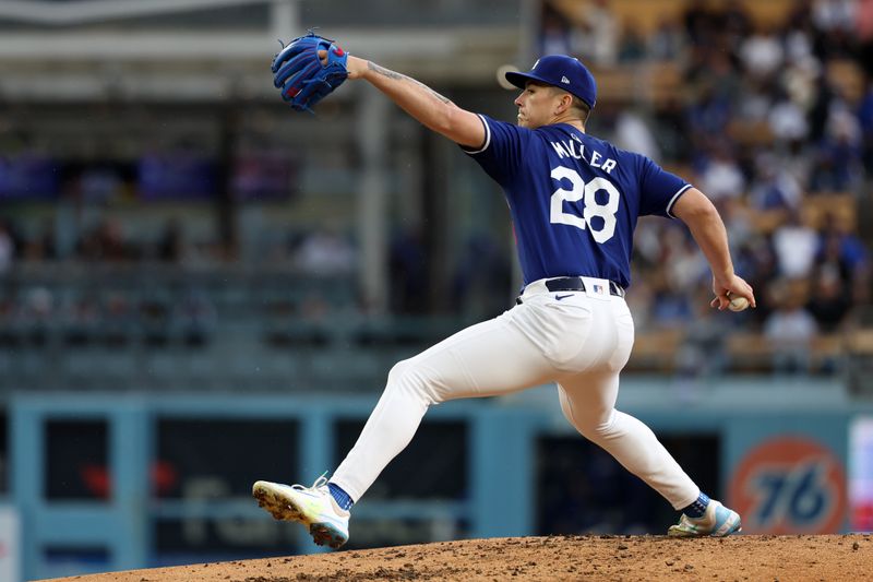 Mar 24, 2024; Los Angeles, California, USA;  Los Angeles Dodgers starting pitcher Bobby Miller (28) pitches during the third inning against the Los Angeles Angels at Dodger Stadium. Mandatory Credit: Kiyoshi Mio-USA TODAY Sports