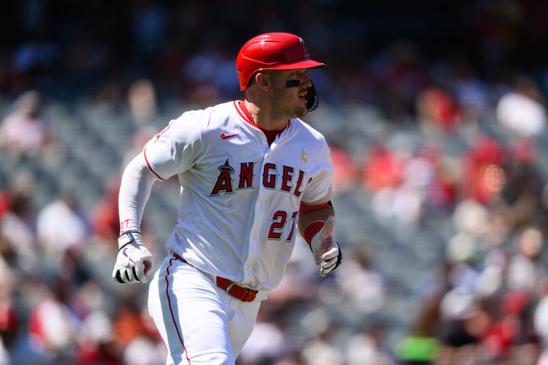 Sep 7, 2025; Anaheim, California, USA; Los Angeles Angels designated hitter Mike Trout (27) runs after hitting a double against the Athletics during the third inning at Angel Stadium. Mandatory Credit: William Liang-Imagn Images