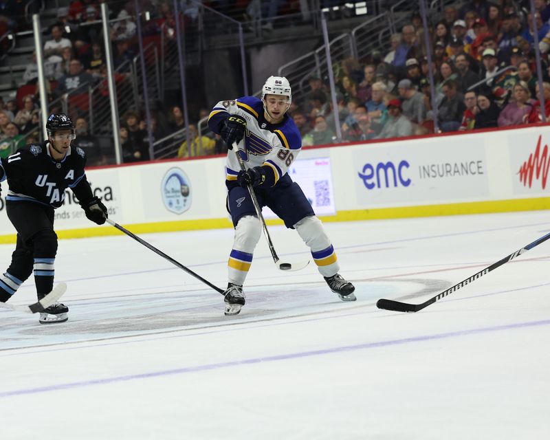 Sep 22, 2024; Des Moines, Iowa, USA; St. Louis Blues Tomas Mrsic (86) passes the puck during their game with the Utah Hockey Club at Wells Fargo Arena. Mandatory Credit: Reese Strickland-Imagn Images

