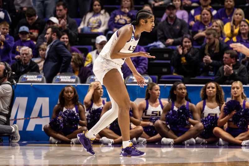 Mar 19, 2023; Baton Rouge, LA, USA; LSU Lady Tigers forward Angel Reese (10) is injured on a play against the Michigan Wolverines and leaves the court during the first half at Pete Maravich Assembly Center. Mandatory Credit: Stephen Lew-USA TODAY Sports