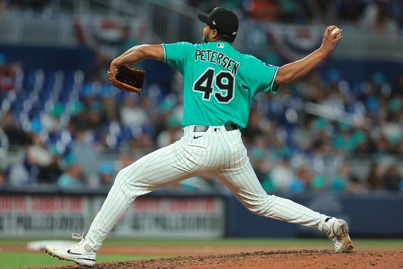 Mar 29, 2026; Miami, Florida, USA; Miami Marlins pitcher Michael Petersen (49) delivers a pitch against the Colorado Rockies during the ninth inning at loanDepot Park. Mandatory Credit: Sam Navarro-Imagn Images Mar 29, 2026; Miami, Florida, USA; Miami Marlins pitcher Michael Petersen (49) delivers a pitch against the Colorado Rockies during the ninth inning at loanDepot Park. Mandatory Credit: Sam Navarro-Imagn Images