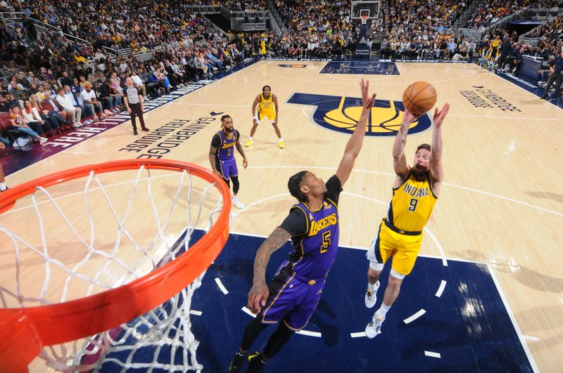 INDIANAPOLIS, IN - MARCH 29:  T.J. McConnell #9 of the Indiana Pacers shoots the ball during the game against the Los Angeles Lakers on March 29, 2024 at Gainbridge Fieldhouse in Indianapolis, Indiana. NOTE TO USER: User expressly acknowledges and agrees that, by downloading and or using this Photograph, user is consenting to the terms and conditions of the Getty Images License Agreement. Mandatory Copyright Notice: Copyright 2024 NBAE (Photo by Ron Hoskins/NBAE via Getty Images)