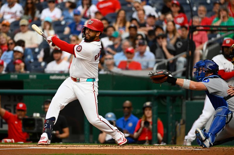 Jun 3, 2025; Washington, District of Columbia, USA; Washington Nationals second baseman Luis Garcia Jr. (2) hits a RBI single against the Chicago Cubs during the first inning at Nationals Park. Mandatory Credit: Brad Mills-Imagn Images