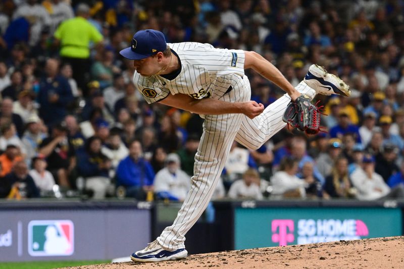 Oct 3, 2024; Milwaukee, Wisconsin, USA; Milwaukee Brewers pitcher Trevor Megill (29) pitches against the New York Mets in the sixth inning during game three of the Wildcard round for the 2024 MLB Playoffs at American Family Field. Mandatory Credit: Benny Sieu-Imagn Images