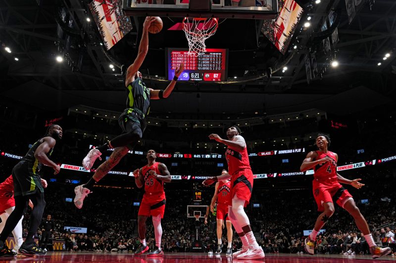 TORONTO, CANADA - JANUARY 15: Jayson Tatum #0 of the Boston Celtics drives to the basket during the game against the Toronto Raptors on January 15, 2025 at the Scotiabank Arena in Toronto, Ontario, Canada.  NOTE TO USER: User expressly acknowledges and agrees that, by downloading and or using this Photograph, user is consenting to the terms and conditions of the Getty Images License Agreement.  Mandatory Copyright Notice: Copyright 2025 NBAE (Photo by Mark Blinch/NBAE via Getty Images)