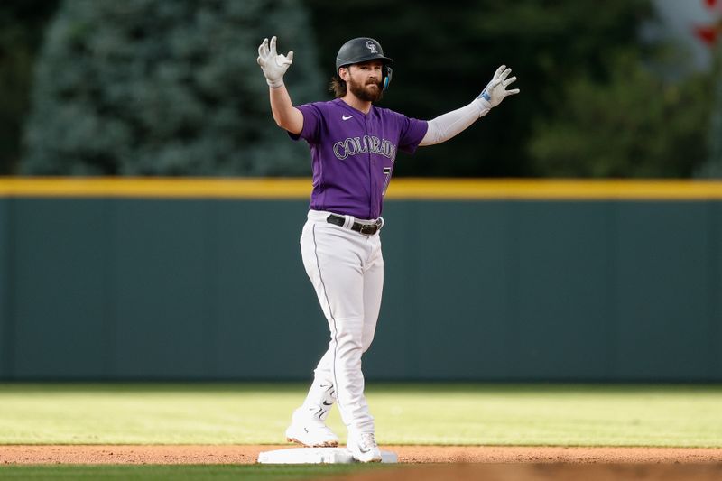 Aug 18, 2023; Denver, Colorado, USA; Colorado Rockies second baseman Brendan Rodgers (7) reacts from second on a double in the first inning against the Chicago White Sox at Coors Field. Mandatory Credit: Isaiah J. Downing-USA TODAY Sports